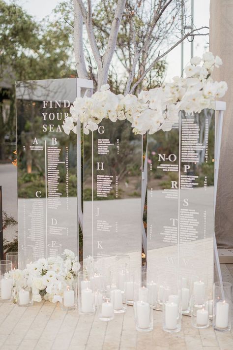 assigned seating inspo Floral Wall Seating Chart, Wedding Seat Card Ideas, Cameo Wedding Ideas, Luxury Seating Chart Wedding, Gold Acrylic Seating Chart Wedding, Luxury Wedding Seating Chart, All White Summer Wedding, All White Decor Wedding, Neutral Wedding Seating Chart