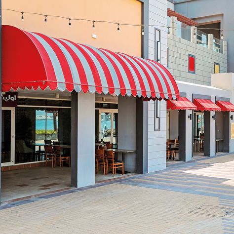 Outdoor Canopies are the most common type of canopies in Dubai. These can be used for big events or backyard fun; top covers let some light shine through but cut out harmful UV rays. For the perfect outdoor shade, best quality, and strong resistance against harsh UV and sun rays choose Royal Blinds LLC in UAE. Snack Display, Awning Shade, Food Counter, Fabric Canopy, Shade Canopy, Canopy Design, Outdoor Restaurant, The Greatest Showman, Canopy Outdoor