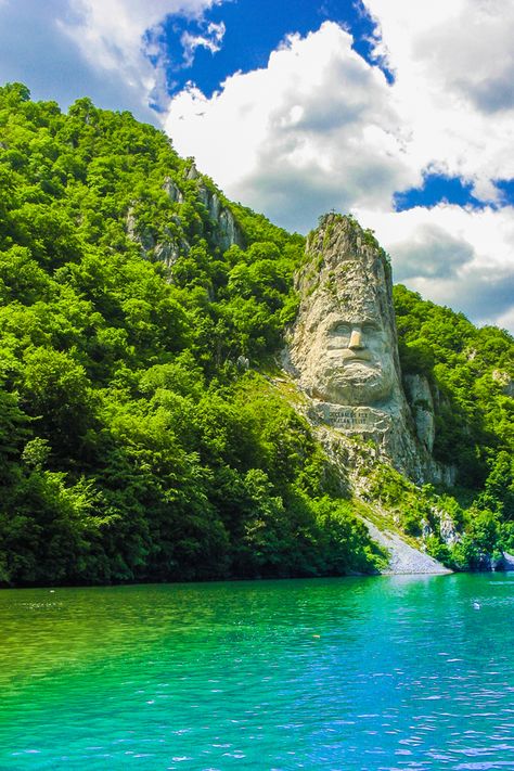 Make your Passage to Eastern Europe with Viking Cruises and travel through the lower Danube river, sailing past the stone face of Romania's Iron Gates: Decebalus, the last king of Dacia (modern-day Romania). #myvikingstory #summer #fall #autumn #winter #spring #vacation #holiday #wanderlust #bucketlist #goals #travel Romania Travel Photography, Romania Travel Guide, Serbia Countryside, Romania Nature, Visit Romania, Viking Cruises Rivers, Viking Cruises, Romania Travel, Danube River