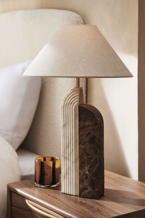 Super stylish, this table lamp has a sculptured two tone marble finish resin base and is finished with a fabric shade. A great addition to your home lighting collection. 60% Resin, 25% Textile, 15% Metal. Table Lamp Living Room, Lamp Inspiration, Lamp Living Room, Table Lamps Living Room, Wardrobe Furniture, Touch Lamp, Beautiful Interior Design, Diy Lamp, Lighting Inspiration