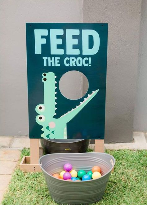 Feed The Croc Ball Toss Game Board from a Chomp Chomp Crocodile Birthday Party on Kara's Party Ideas | KarasPartyIdeas.com (7) Jungle Theme Birthday Games, Party Animal Birthday Theme Games, Animal Party Decorations Diy, Animal Birthday Party Activities, Zoo Birthday Games, Snake Birthday Party Games, Two Wild Activities, Outback Birthday Party Ideas, Reptile Party Decor