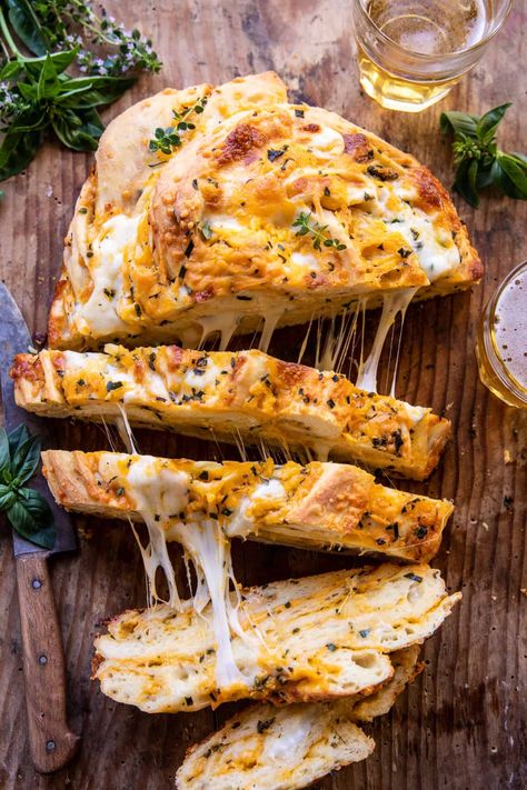 Soft Garlic Herb Cheddar Cheese Bread | halfbakedharvest.com Thanksgiving Garlic Bread, Turkish Loaf Bread, Crusty Rustic Bread Recipe, Garlic Tuscan Bread Recipe, Homemade Cheese Rolls, Bakery Style Bread, Homemade Herb Bread, Cozy Lunch Ideas, Cheddar Garlic Sourdough Bread