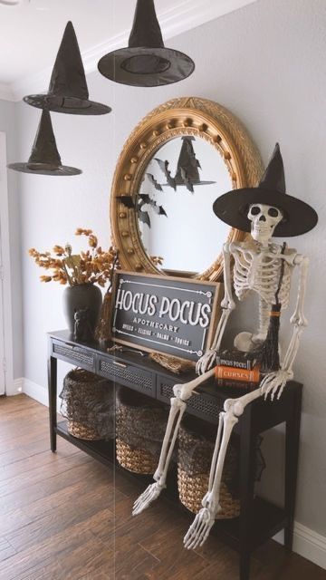 Cat Theme Halloween Decor, Skeleton At Table, Boho Halloween Aesthetic, Halloween Entrance Table Decor, Which Theme Halloween Decor, Halloween Decorations Fireplace Mantles, Entryway Table Decor Halloween, Entryway Halloween Decor Ideas, Halloween Front Entry Ideas