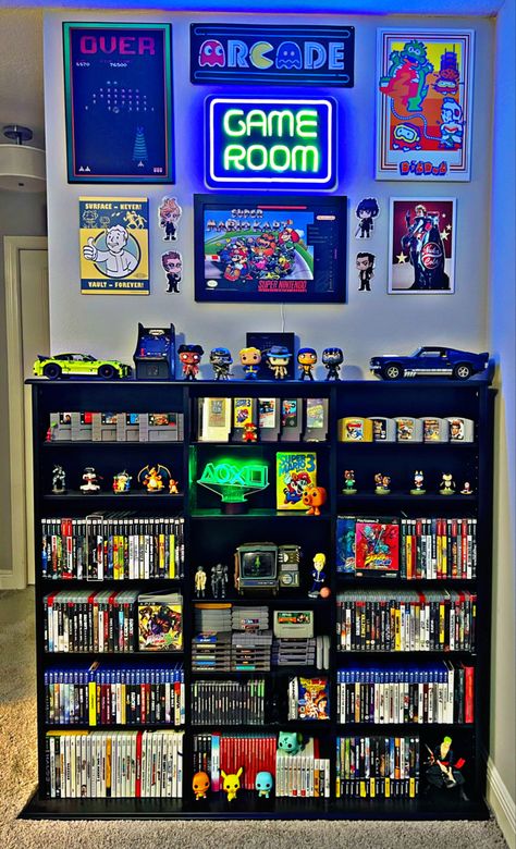 Video Game Display, Game Room, Video Games Gaming Wall Shelves, Gaming Room Display Ideas, Game Room Collection, Arcade Living Room Ideas, Game Console Collection, Men’s Game Room Ideas, Video Game Room Decor Ideas, Gamer Man Cave Ideas, Gamer Tv Setup