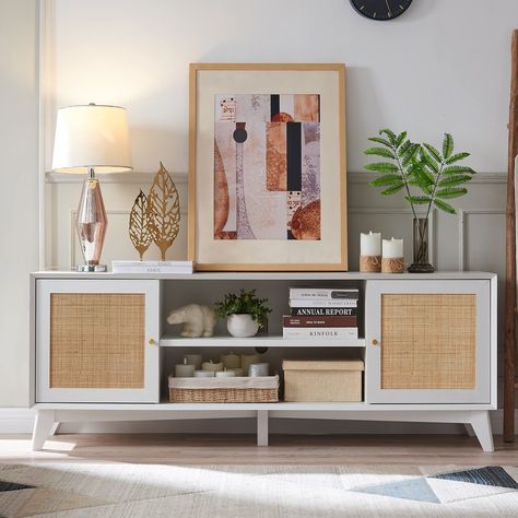 PRICES MAY VARY. Elevate Your Space: Infused with breezy boho-chic vibes by OKD's designers, this media console TV stand seamlessly blends mid-century modern aesthetics with a touch of natural rattan embellishments. Crafted to exude simplicity and elegance, it brings a tranquil, carefree ambiance to any home. Ample & Adaptable Storage: With removable and adjustable shelves in each side cabinet of this entertainment center, tailor your storage to fit media, electronics, books, and more. The 66” w Long Entertainment Center, Tv Console Storage, Entertainment Center Modern, Shelves Large, Rattan Tv Stand, Low Tv Stand, Modern Tv Console, 65 Inch Tv, Tv Console Modern