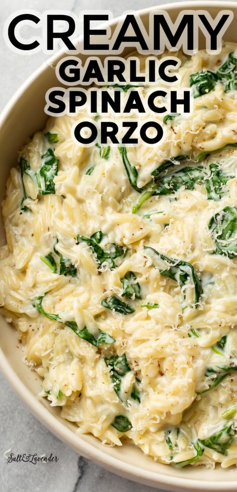 This easy creamy garlic spinach orzo recipe is the best side dish! Orzo pasta in a garlic cream sauce is total comfort food made all in one pot. It's like risotto but quicker and easier! Orzo Pasta Side Dishes Easy, Pasta Dish With Spinach, Creamy Spinach Orzo Recipes, Essen, Creamy Garlic Orzo Pasta, Creamy Garlic Orzo Recipes, Creamy Lemon Garlic Orzo, Creamy Garlic Spinach Pasta, Creamy Spinach Parmesan Orzo