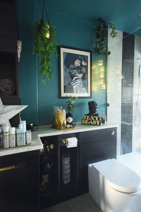 Luxury Teal Master Bathroom Makeover Reveal - Part 1 | Dark, large, dream bathroom inspiration and design. Get interior design ideas with this modern maximalist bathroom decor with quirky accessories and blue teal paint, blush and gold accents and hanging plants. Maximalist Bathroom Decor, Maximalist Bathroom, Teal Bathroom Ideas, Quirky Accessories, Teal Bathroom Decor, Modern Maximalist, Teal Bathroom, Luxury Master Bathrooms, Teal Paint