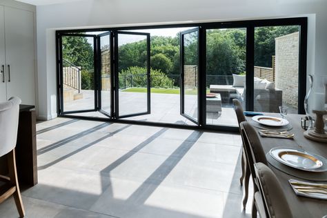 Stunning Aluminium Bi Folding Doors from Bi Folding Door Prices, Design, Price and order instantly online. Available with 12 months 0% finance, either professionally fitted or for DIY. Choose from 2-7 Panel designs in a range of stock colours, bespoke RAL colours are also available. We are the bi fold door experts and we are here to help. #bifold #bifoldoor #bifoldingdoors #aluminiumbifolds #concertinadoors Bifold Doors Onto Patio, Prices Design, External Bifold Doors, Bifolding Doors, Bi Fold Doors, Aluminium French Doors, Folding Patio Doors, Aluminum Doors, Fold Door