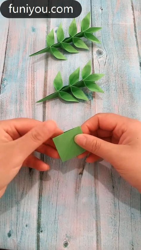 Origami's precise designs and geometric patterns add sophistication to any space. Christmas Decor Ideas Origami, Flower Origami Aesthetic, Origami Lily Pad, Origami Vines, Origami Flowers Aesthetic, Origami Flower Stem, Origami Plants Tutorial, Paper Oragami Ideas, Paper Succulents Diy