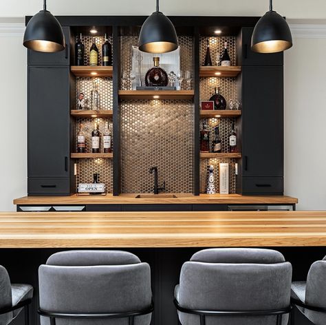 25 Basement Bar Ideas You Should Try Black Cabinet Wet Bar Ideas, Wine Cellar Bar Ideas, Game Room And Bar Ideas, Basement Kitchenette Ideas With Island, Finished Basement Living Room Ideas, Basement Bar And Theater, Beautiful Home Bars, Basement Bar U Shape, Wall Bar Ideas For Home Modern