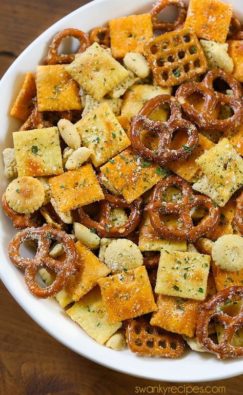 Ranch Chex Mix made for a crowd. My favorite snack mix is loaded with peanuts, cheese crackers, pretzels, and rice cereal. This easy zesty Ranch Chex Mix is perfect for parties and school lunches. Ranch Seasoning Chex Mix Recipes, Cheese It Mix Recipes, Snack Ideas To Bring To A Party, Ranch Chex Mix Snack, Christmas Snacks Salty, Salty Snack Mix Easy, Party Snack Foods For A Crowd, Cheap Trail Mix Recipes, Cheez It Snack Mix Recipe Ranch