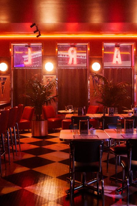 Vinyl banquettes and lino-covered walls evoke the heyday of the American diner in this downtown Detroit restaurant.

Karl’s is located inside the city’s Wurlitzer Building, which was once the headquarters of the jukebox manufacturer, but is now home to The Siren Hotel – which launched last year. 

Photography courtesy of ASH NYC

#detroit #hotels #restaurants #diner #interiorstyle #interior Red Light Restaurant, 70s Diner, Diner Lighting, Neon Diner, Neon Restaurant, Siren Hotel, Cool Restaurant Design, Bar Lighting Design, Yellow Restaurant