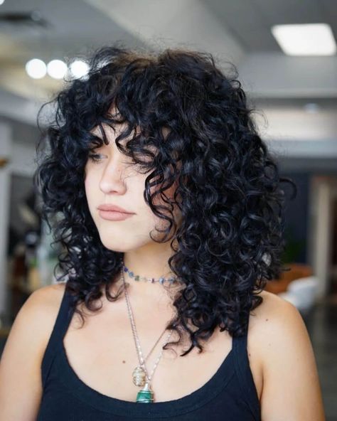 Soft, Curly Wolf Cut Shoulder Length Edgy Hair, Gothic Curly Hair, Short Curly Layered Haircuts, Short Curly Hair Haircuts, Curly Wolf Cut With Bangs, Short Thick Curly Hair, Curly Hair Cuts With Layers And Bangs, Curly Shag Haircut Medium, Curly Shag With Bangs