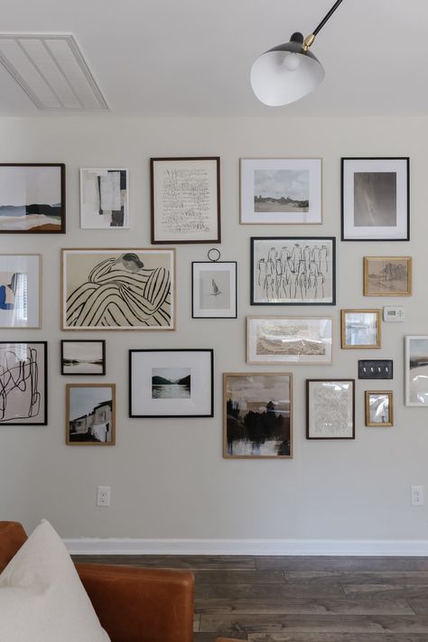 How To Create A Large Vintage Modern Gallery Wall While Keeping it Cohesive Large Art Wall Living Room, Gallery Wall With Small Frames, Gallery Wall With Rectangle Mirror, Modern Vintage Wall Art, Large Picture Frame Wall, How To Build A Gallery Wall, Art Print Gallery Wall, Random Gallery Wall, Loft Gallery Wall