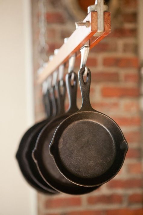 10 Kitchens With Cast Iron Pans on Display Kitchen Inspiration | The Kitchn Cast Iron Skillet Hanger, Skillet Hanger, Hanging Cast Iron Pans, Iron Cleaning, Cast Iron Care, Tiny Farm, Bar Stuff, Kitchen Favorites, Cast Iron Cleaning