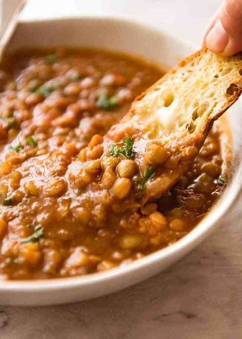 Close up of bread being dunked into Lentil Soup Lentil Soup, Recipetin Eats, Lentil Soup Recipes, Lentil Recipes, Cheese Soup, Idee Pasto Sano, Butter Chicken, Soup Recipe, Soup And Salad