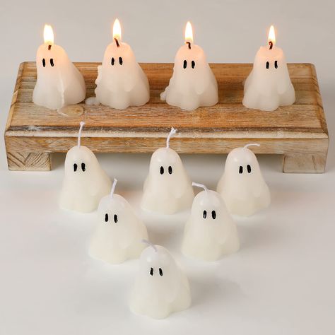 PRICES MAY VARY. Satisfy Your Use Demands: you will get 10 pieces of halloween candles in the package in total, and they are all in the same shape, which can provide you with enough quantity and rich choices for your daily decor and holiday use Ideal Festive Decor: these halloween home decors adopt the shape of ghost, and each piece has 2 big eyes, which look interesting and cute, very in line with the theme of the festival, enhance an intense Halloween atmosphere in your home Compact Size: each Halloween Candle Decor, Candles For Halloween, Candles Burning, Spooky Candles, Specialty Candles, Casa Halloween, Cute Halloween Decorations, Ghost Candles, Halloween Tablescape