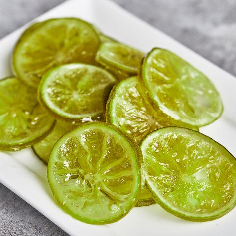 Candied Lime Slices Recipe | Sur La Table Candied Limes, Candied Fruit Recipes, Fruits Recipes, Candied Lemon Slices, Candied Orange, Lime Recipes, Candied Lemons, Candied Fruit, Slices Recipes