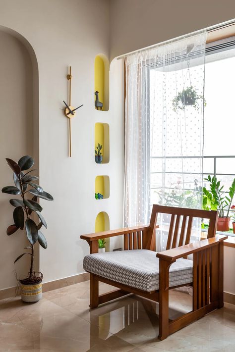 Mumbai: A 2BHK Andheri home that packs colour and smart design in under 700 sq ft | Architectural Digest India Rincon, Sofa Wall, White Brick Walls, Traditional Living, Indian Home, Traditional Living Room, Smart Design, Family House, Decoration Design