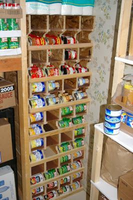 Here is a quick snap of some can rotation shelves that I put together a couple weeks back.  We have 7 shelves with 4 slots ea.  Each slot wi... Can Rotation System Diy, Canned Good Storage, Diy Food Storage, Shelves Pantry, Corn Food, Food Rotation, Food Storage Rooms, Food Storage Shelves, Food Storage Cabinet