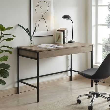 Cultivate mid-century style in your home office, game room, or vanity area with this modern desk. The sleek lines of its steel base are offset by a sturdy MDF desktop, finshed in a rustic tone. This desk features three push-to-open drawers for storage, while the open lower space provides plenty of room to settle in and take on the day. Its time to work from home in style! Features: A mid-century modern design for your entryway, living room, den, and more. Crafted from sturdy steel and durable MD Home Office Game Room, Grey Writing Desk, Office Game Room, Console Table With Drawers, Grey Desk, Vanity Area, Black Desk, Bush Furniture, Office Furniture Desk