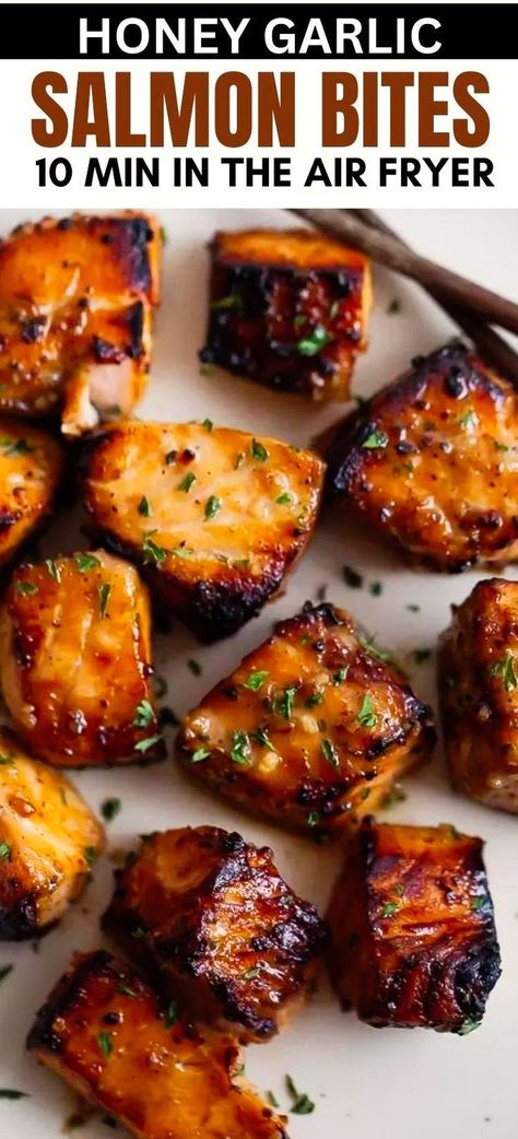 This quick and easy recipe for healthy Air Fryer Honey Garlic Salmon Bites offers succulent, bite-sized pieces of salmon coated in a sweet and garlicky sauce, cooked to perfection in your air fryer or Ninja Foodi in under 15 minutes! Make for meal prep and serve with rice, quinoa, in a stir fry, or on top of steamed vegetables! Trader Joe’s Meal Prep Dinner, Honey Garlic Salmon Bites, Garlic Salmon Bites, Air Fried Salmon, Fried Salmon Recipes, Steamed Salmon, Air Fryer Recipes Salmon, Salmon Bites Recipe, Salmon Meal Prep