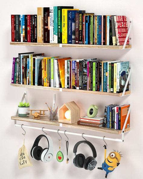 PRICES MAY VARY. 【Sturdy Large Size Floating Shelves:】This is wall shelf carefully handmade using metal and solid wood boards. This shelves for wall storage is larger than other standard floating shelf: 33x11.2x6 inches, and can support a weight of 40 pounds. Able to place more books, photo frames, DVD/CD cases, collectibles, succulents, etc. 【Practical Cross Bars and Hooks】: These white floating shelves are equipped with a 33-inch long cross bar and 6 hooks. It is a wall book shelf especially s Wall Shelf White, Floating Shelves Bedroom Books, Wall Mounted Book Shelf, Wall Shelf Decor Bedroom, Book Shelf Wall Ideas, Shelf Kitchen Decor, Book Shelf Ideas Bedroom, Book Shelves Wall, White Kitchen Backsplash Ideas