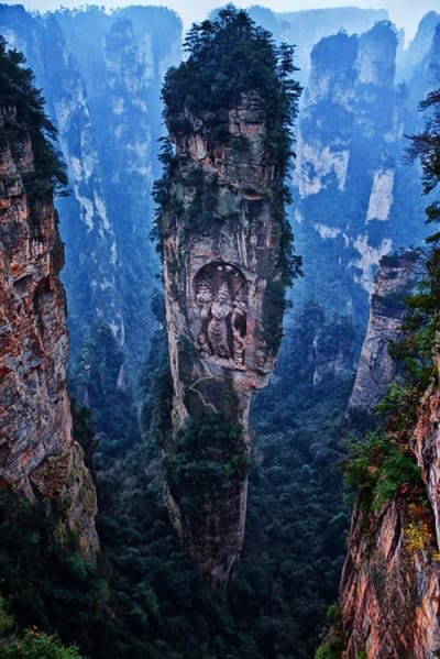 The truth:: The tree spires are real, but that Buddha carved into the side? Totally Photoshopped. Tumblr, Amazing Nature, Asia Travel, Casablanca, Nature, Interior Design Kitchen, Mountain Landscape Photography, Beautiful Places In The World, Mountain Landscape