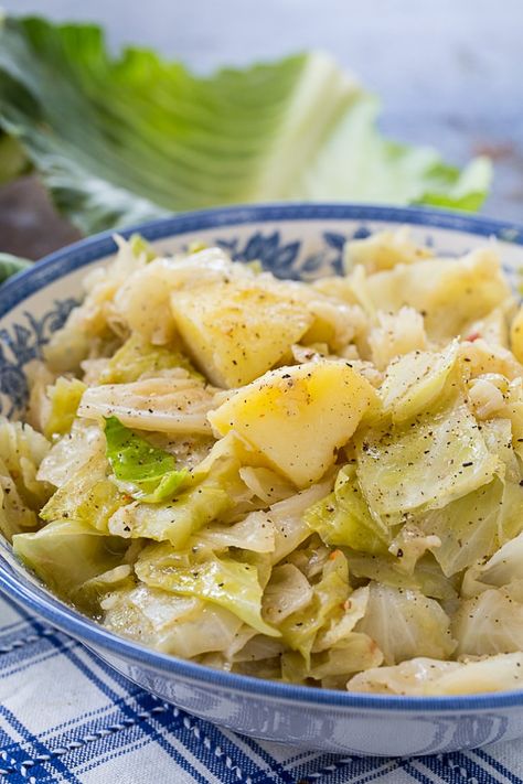 Smothered Cabbage and Potatoes Irish Potatoes And Cabbage, Smother Cabbage Recipes, Chicken Cabbage And Potatoes, Smothered Cabbage With Bacon, Crockpot Cabbage And Potatoes, Boiled Cabbage And Potatoes, Potatoes And Cabbage Recipes, Boiled Cabbage Recipe Southern, Cabbage Potato Recipes