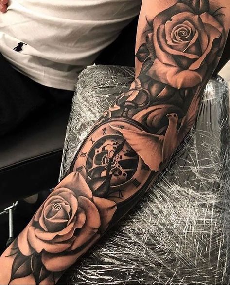 35 Most Powerful Sleeve Tattoos For Men Rosen Tattoo Mann, Clock And Rose Tattoo, Portrait Tattoo Sleeve, Tato Jari, Half Sleeve Tattoos Forearm, Rose Tattoo Sleeve, Rose Sleeve, Lion Tattoo Sleeves, Rose Tattoos For Men