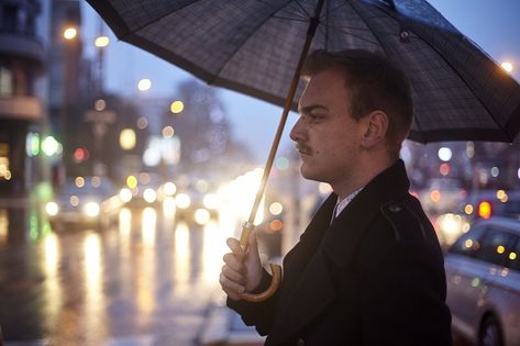 Holding Umbrella, Holding An Umbrella, Umbrella Man, Caucasian Woman, Busy Street, Bokeh Background, Out Of Focus, On A Rainy Day, Man Standing