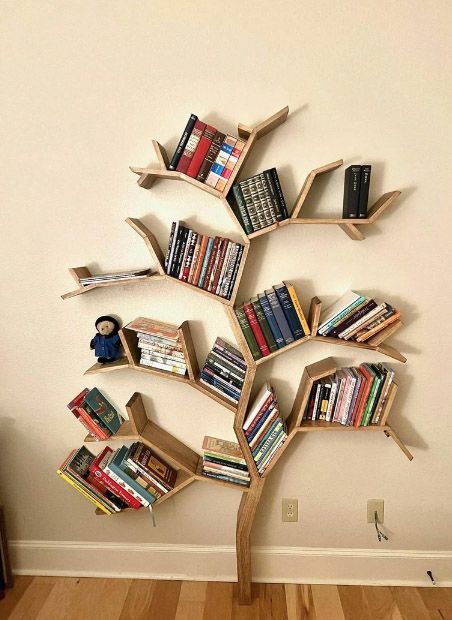 The Best Tree Bookshelves - BOOKGLOW Wooden Tree Bookshelf, Wooden Library Design, Wooden Library Bookshelves, Wall Tree Bookshelf, Wooden Shelves Diy, Diy Tree Bookshelf, Tree Bookshelf Diy, Book Tree Shelf, Bookshelves For Kids Room