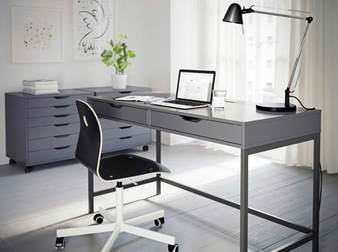 I adore these drawer units - would hold tons of goodies, mats, prints, frames, etc.  Only $119 each.  Desk $159 A grey home office with ALEX desk and drawer units in grey and VÅGBERG chair in black. Grey Office Furniture, Ikea Stand, Ikea Office Desk, Ikea Home Office, Mesa Home Office, Ikea Office, Classy Office, Ikea Alex, Ikea Design