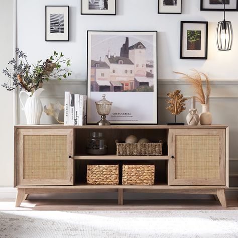 PRICES MAY VARY. Elevate Your Space: Infused with breezy boho-chic vibes by OKD's designers, this media console TV stand seamlessly blends mid-century modern aesthetics with a touch of natural rattan embellishments. Crafted to exude simplicity and elegance, it brings a tranquil, carefree ambiance to any home. Ample & Adaptable Storage: With removable and adjustable shelves in each side cabinet of this entertainment center, tailor your storage to fit media, electronics, books, and more. The 66” w Shelves Large, 75 Inch Tv, Rattan Door, Television Stand, Wood Media Console, Mid Century Modern Tv Stand, Wood Tv Console, Tv Console Table, Modern Entertainment Center