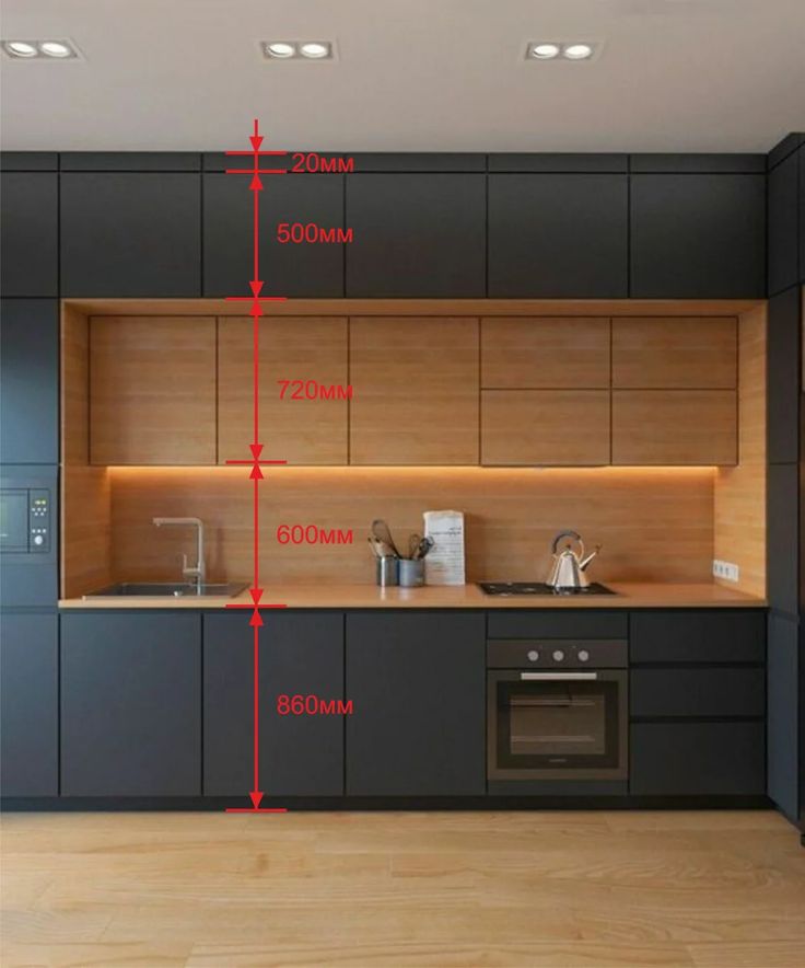 a kitchen with an oven, sink and counter top measurements for the space between the cabinets