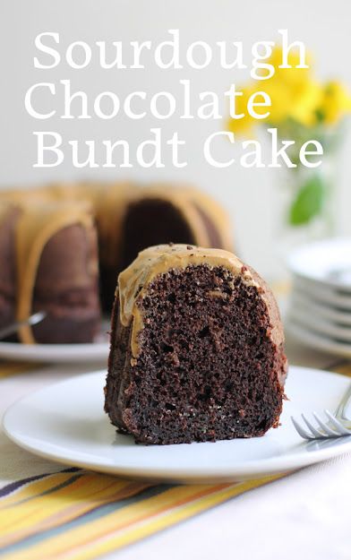 a chocolate bundt cake on a white plate with a fork and yellow striped table cloth