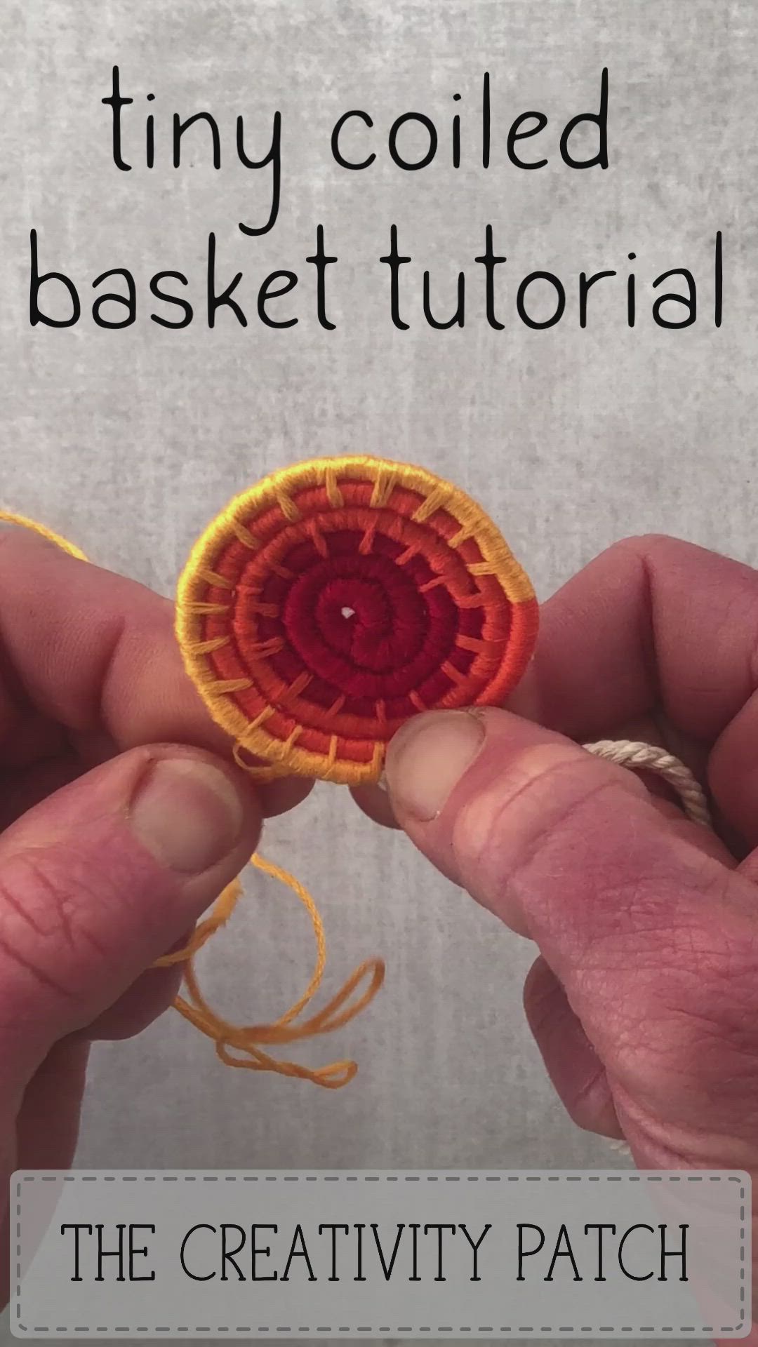 This may contain: two hands holding an orange and yellow object with the words tiny coiled basket tutorial on it