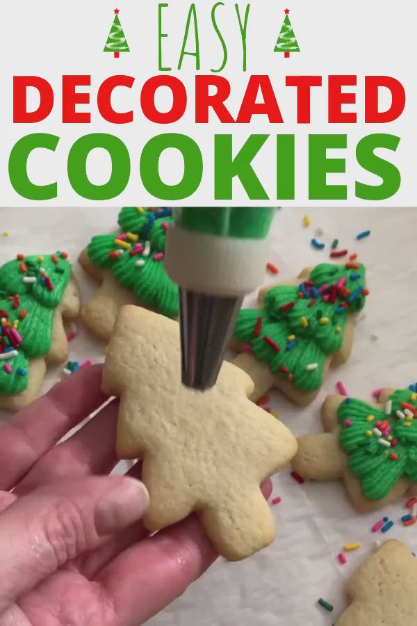 This may contain: someone is decorating cookies with green icing