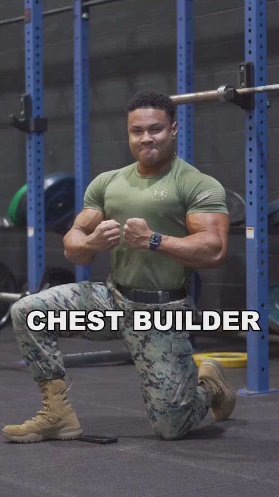 This may contain: a man squats on the ground in front of a gym rack with his arms crossed