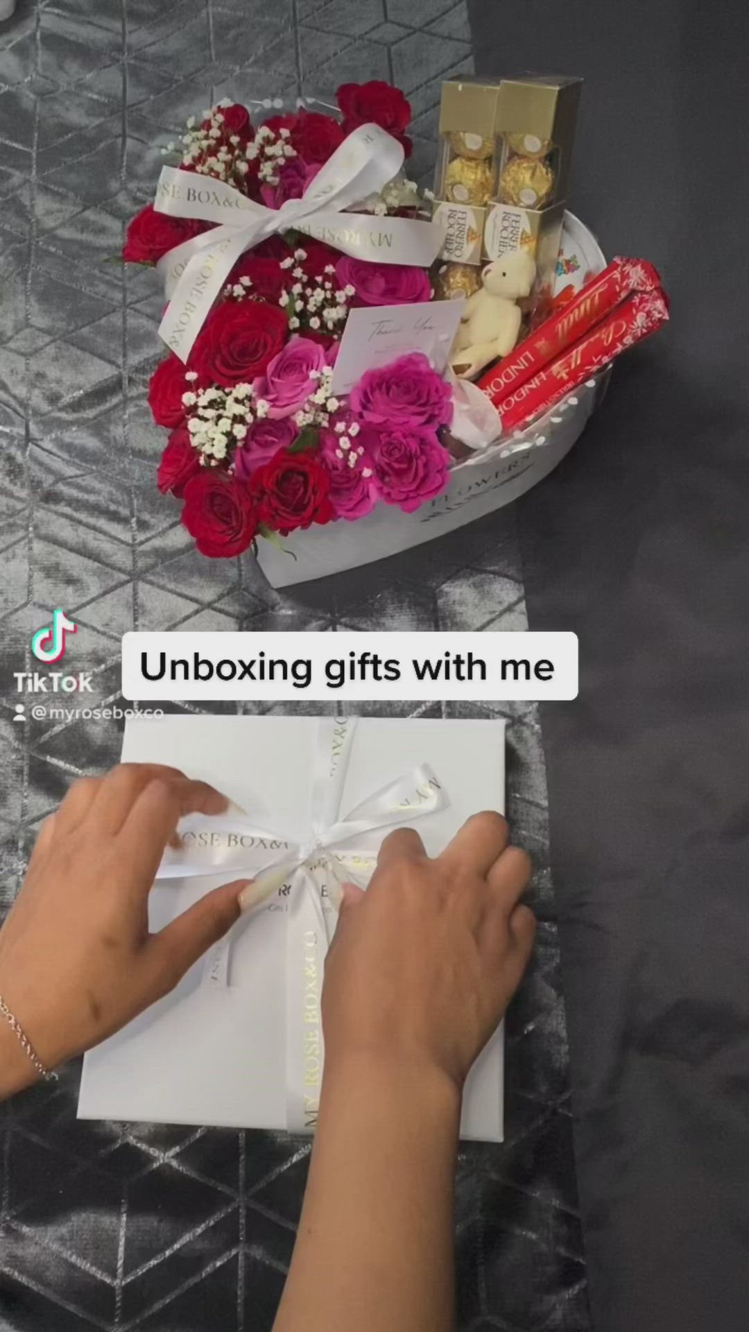 This may contain: someone is unboxing gifts with me on their laptop and the box has flowers in it