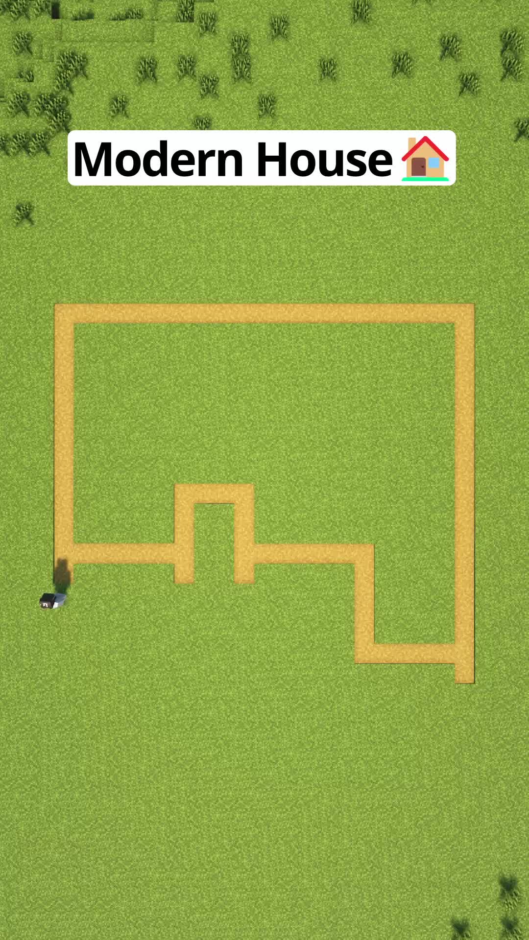 This may contain: an aerial view of a field with a house in the middle