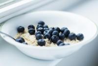 blackberry on white ceramic bowl