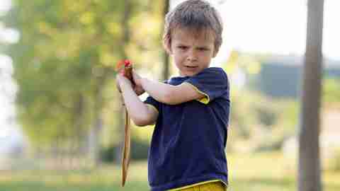 Oppositional Defiant Disorder (ODD) and ADHD plays with a toy sword.
