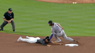 Elias Díaz throws out Tyrone Taylor