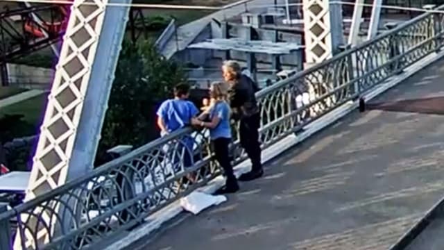 Jon Bon Jovi convinces a woman about to jump off a bridge to reconsider her decision.