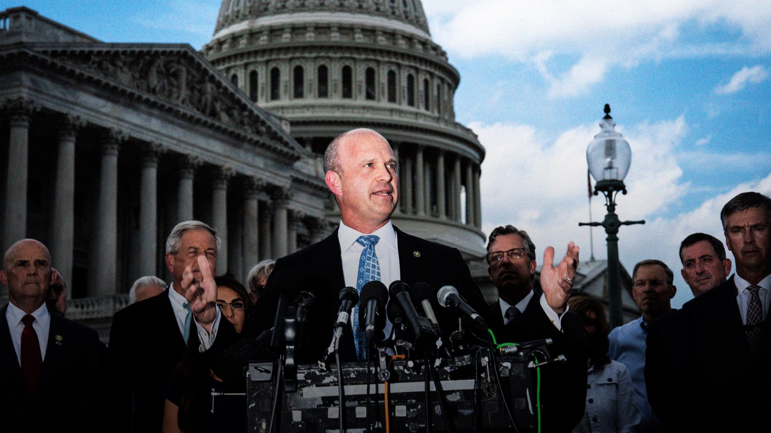 Kevin Roberts, president of The Heritage Foundation, speaks with members of the conservative House Freedom Caucus during a news conference on Capitol Hill on Tuesday, Sept 12, 2023, in Washington, DC. 