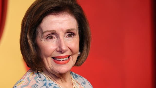 Nancy Pelosi smiles on the red carpet at the Vanity Fair afterparty following the 96th Academy Awards.