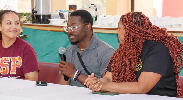 George in a question-and-answer session with leaders in Guyana.