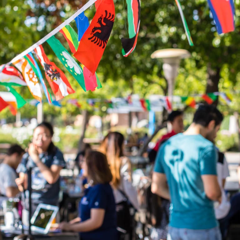 International flag banner at ISU coffee hour