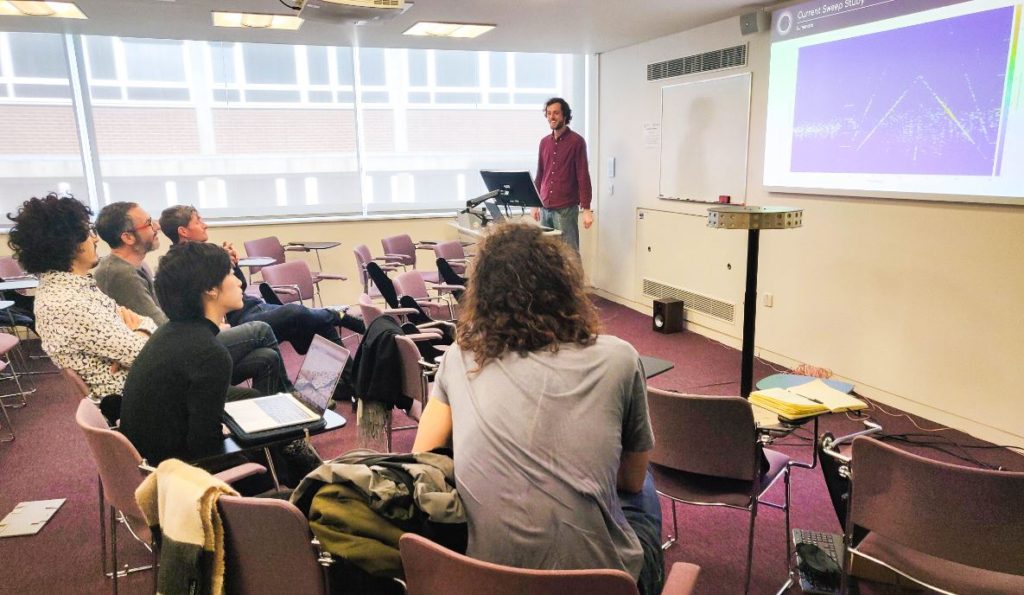 Lumenate co-founder Tom Giving a presentation on the project's neuroscience to researchers at Imperial College London including Dr Robin Carhart-Harris